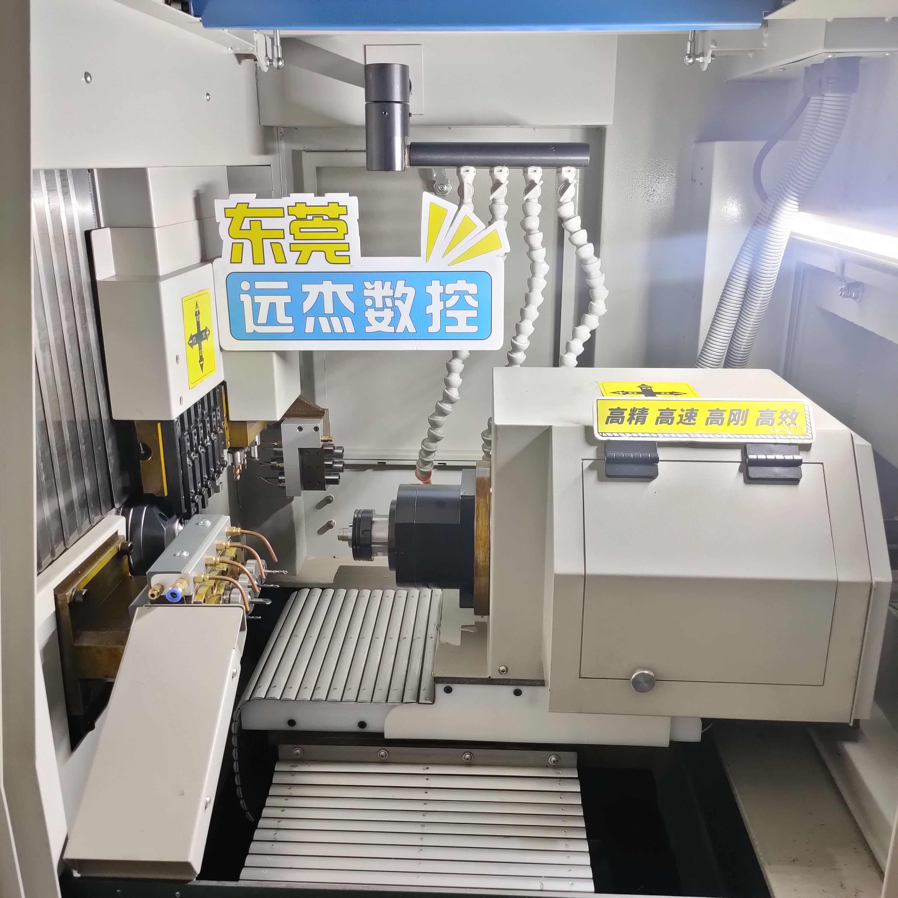 Double spindle double head CNC lathe